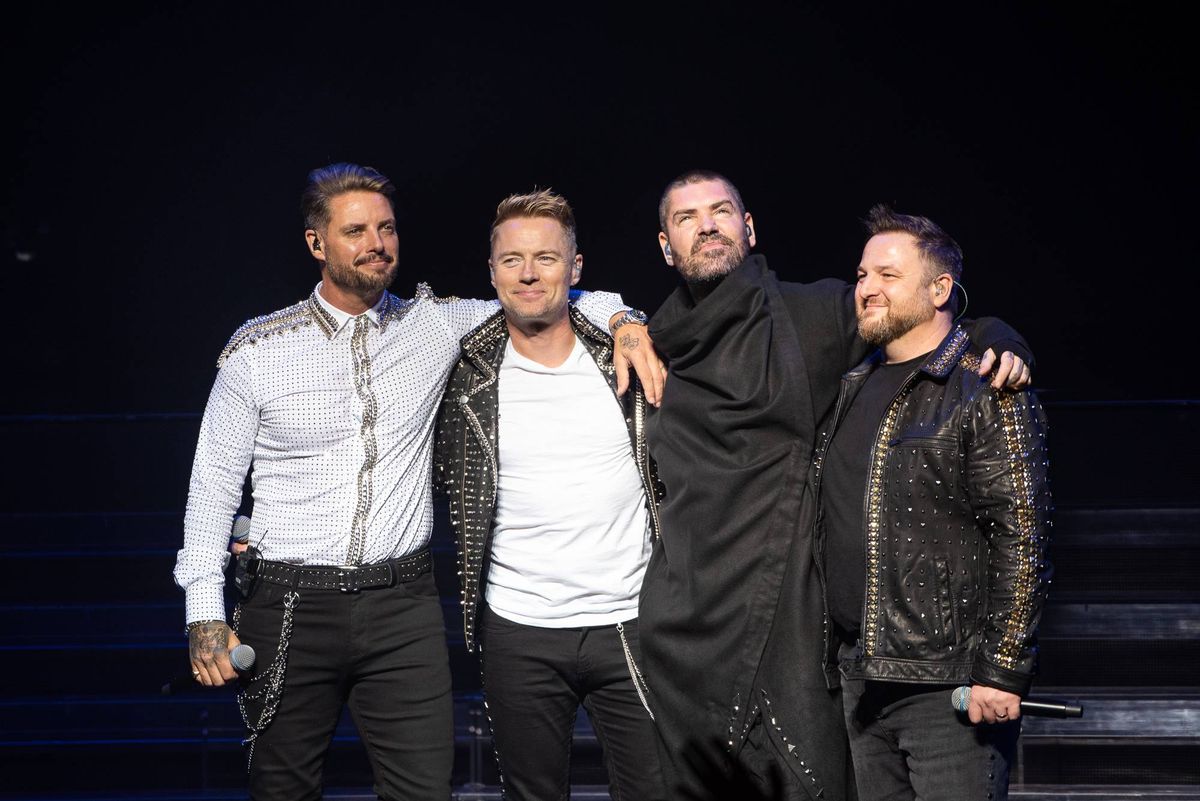 LONDON, ENGLAND - OCTOBER 21: (EDITORIAL USE ONLY) (L-R) Keith Duffy, Ronan Keating, Shane Lynch and Mikey Graham of Boyzone perform on stage during "The Final Five tour" at the London Palladium on October 21, 2019 in London, England. (Photo by Joseph Okpako/WireImage)