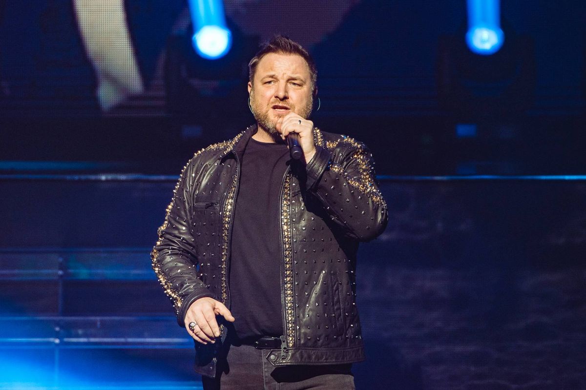 Mikey Graham of Boyzone performs on stage at London Palladium during "The Final Five tour" on October 21, 2019 in London, England