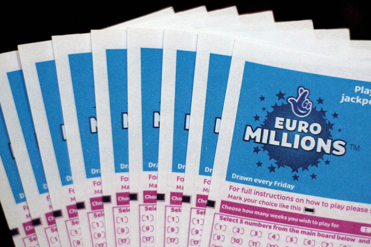 Lottery tickets for the EuroMillions jackpot are displayed in central London, on February 8, 2008. Lottery history could be made later Friday in the EuroMillions draw. The 95m (approx 127.6m euros/185m USD) prize will be the biggest pay-out of its kind in the world if it is won by a single ticket holder. AFP PHOTO/SHAUN CURRY (Photo credit should read SHAUN CURRY/AFP via Getty Images)