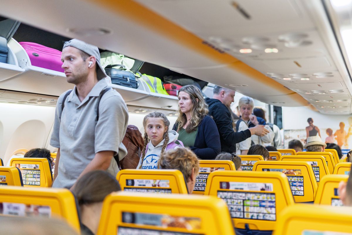 Vilnius, Lithuania - July 13, 2025: Passengers boarding Ryanair flight. Ryanair is biggest budget low-cost airline in Europe.