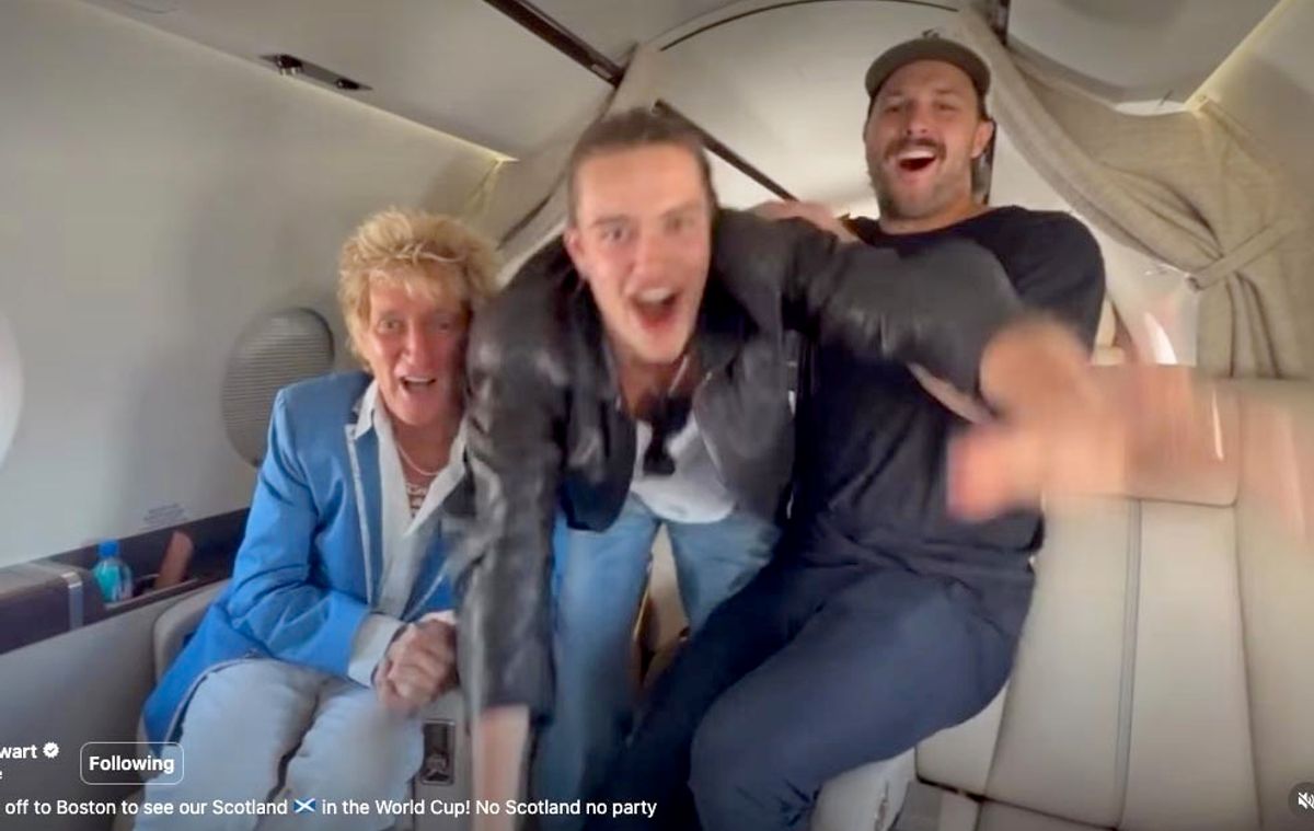 Rod and his sons sang 'No Scotland no party!' as they got in the mood for the World Cup group game on their private jet