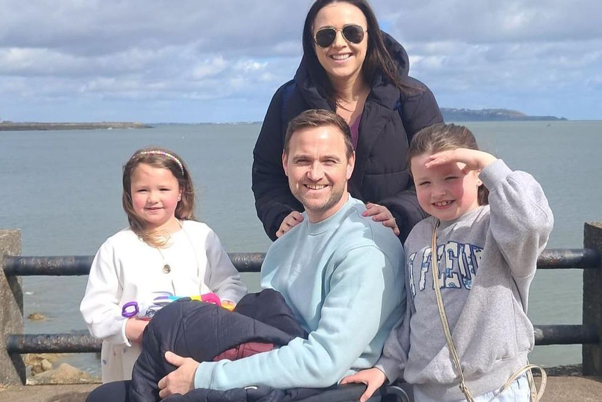 Garda Keith Fox with his wife Christine and their two children