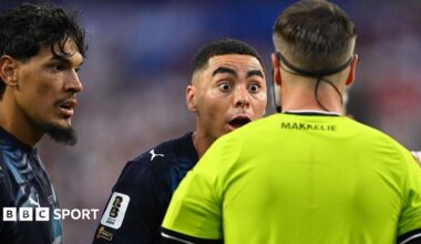 Paraguay forward Miguel Almiron reacts to Dutch referee Danny Makkelie's decision to book him for diving