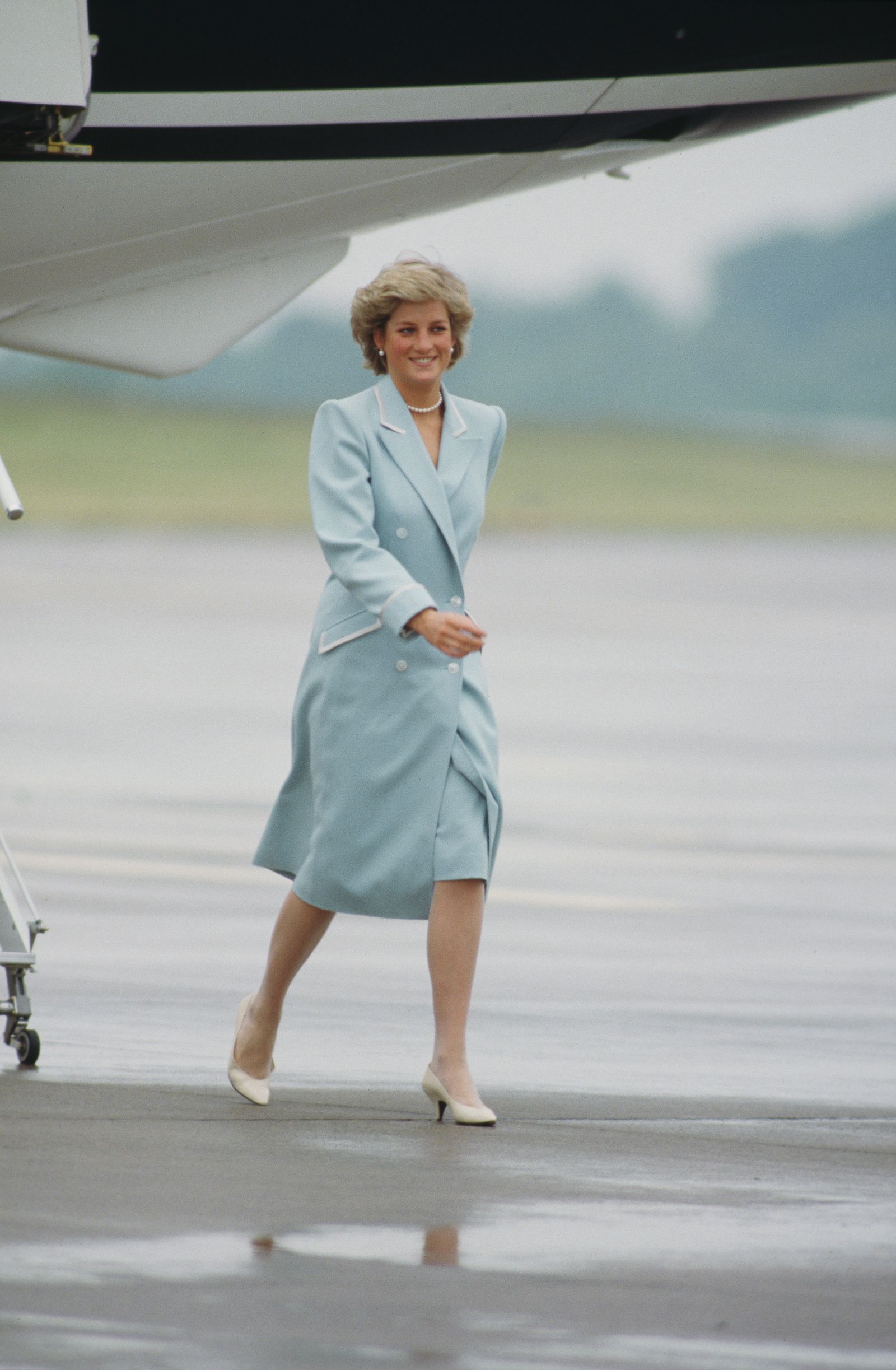 Image may contain Diana Princess of Wales Person Clothing Coat Footwear High Heel Shoe and Adult