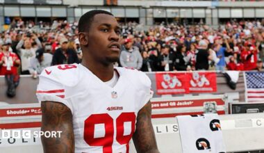 The San Francisco 49ers' Aldon Smith sits on the sidelines