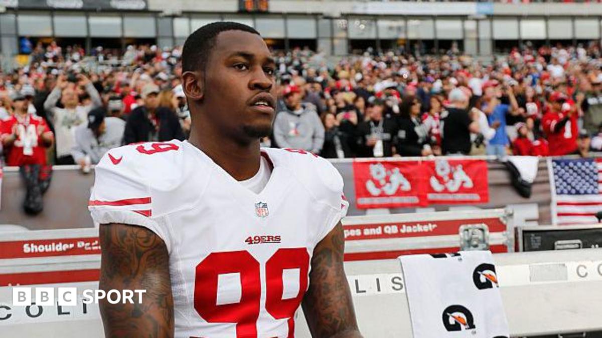 The San Francisco 49ers' Aldon Smith sits on the sidelines