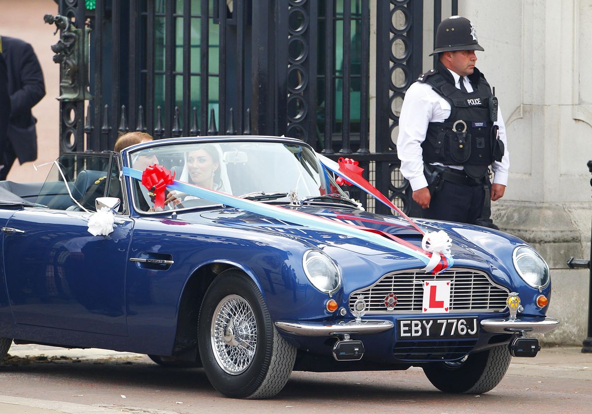 On their 2011 wedding day, William and Kate famously departed in King Charles III's Aston Martin DB6 Volante