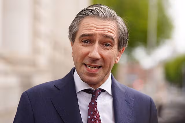 Simon Harris speaks to journalists