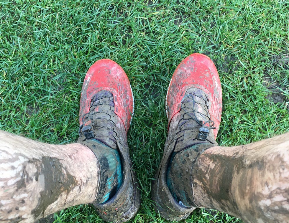 mudcovered shoes on grass