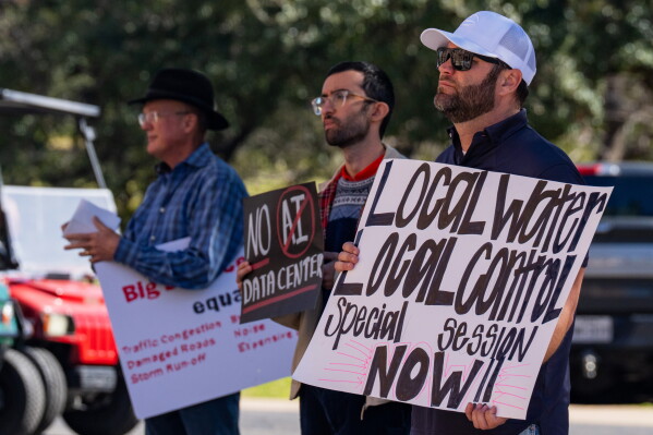 Advocacy groups and community members protest laws surrounding data centers while outside the Texas Capitol, in Austin, Texas, Feb. 23, 2026. (Mikala Compton/Austin American-Statesman via AP, File)