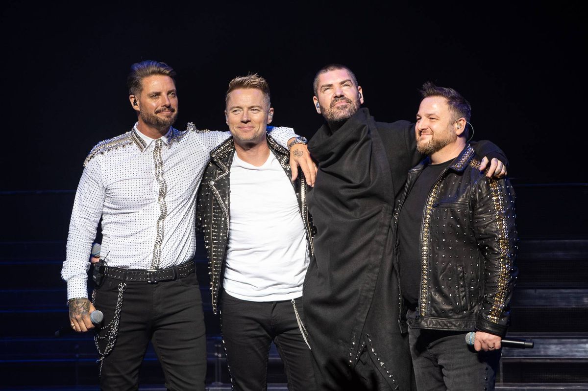 LONDON, ENGLAND - OCTOBER 21:  (EDITORIAL USE ONLY) (L-R) Keith Duffy, Ronan Keating, Shane Lynch and Mikey Graham of Boyzone perform on stage during "The Final Five tour" at the London Palladium on October 21, 2019 in London, England.  (Photo by Joseph Okpako/WireImage)