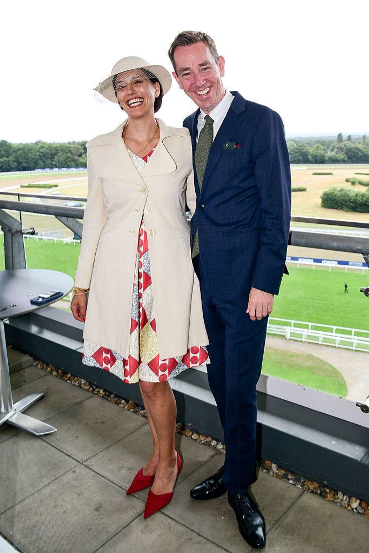 Dr Clare Kambamettu and Ryan Tubridy join Elgin Loane, Publisher of The Irish Post, for The King George for a day of hospitality curated by Zafar Rushdie at Ascot Racecourse on July 26, 2025 in Ascot, England