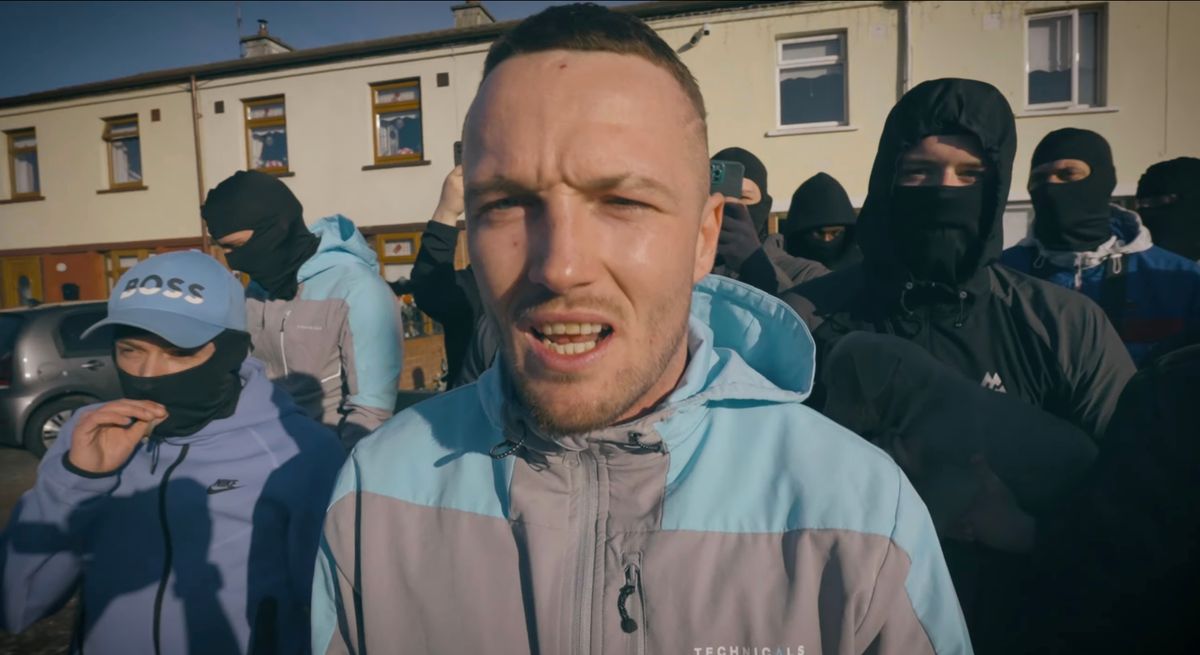 The pair are an aunt and cousin of emerging rap artist Dean Thornton (centre in grey and blue tracksuit), pictured in a music video filmed on the streets of Drogheda