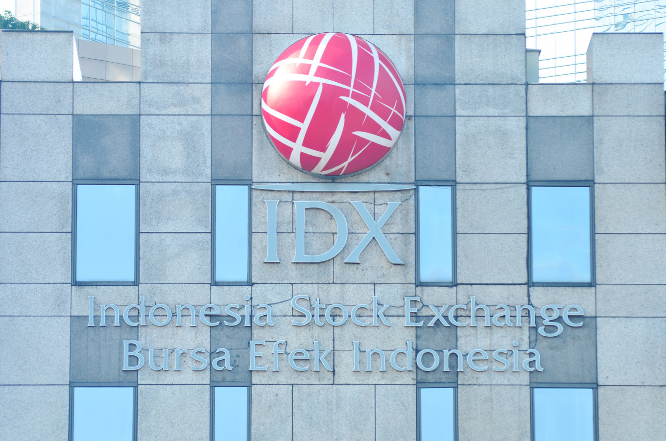 A logo of the Indonesia Stock Exchange (IDX) is seen at the IDX building in Jakarta on Sunday, April 19, 2026.