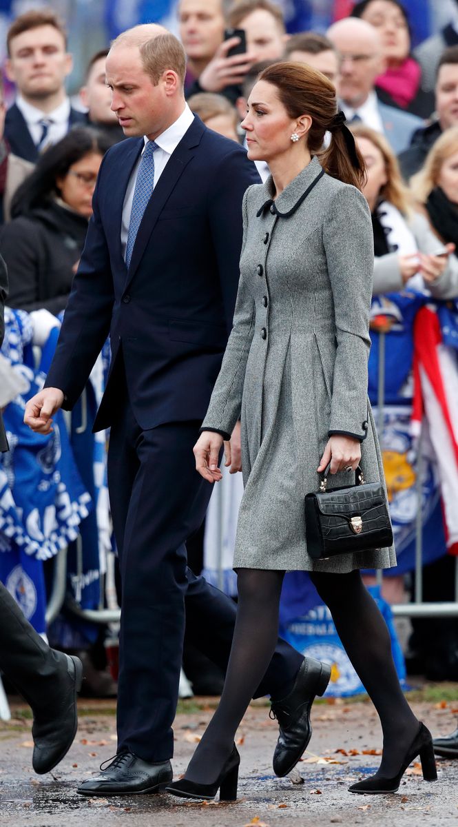 Kate Middleton styled her Aspinal of London Midi Mayfair bag with a polished monochromatic look during a royal engagement.