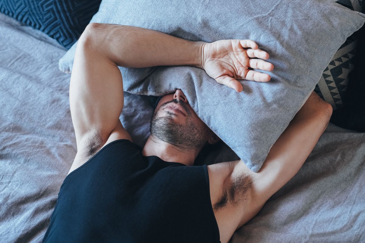 Man resting in his bedroom is feeling lost