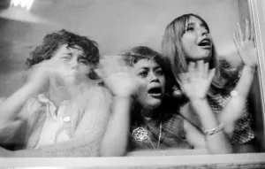 Hysterical fans outside of the Cow Palace waiting to get a glimpse of The Beatles August 31, 1965