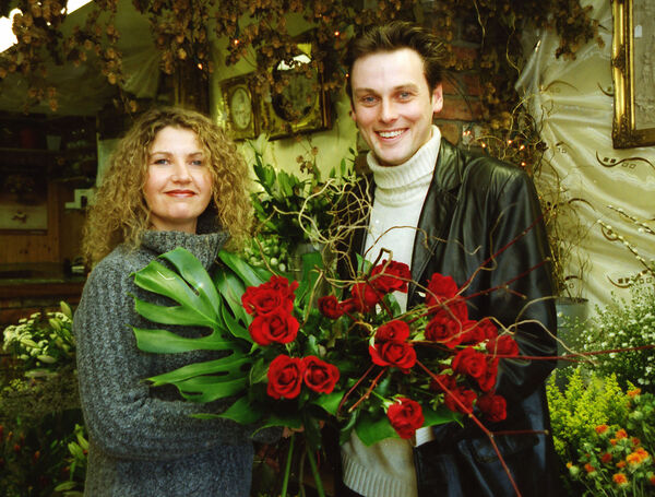  Pictured at "Flowers by Ray" were Margaret Duggan who was helping Michael Thompson to make his selection of red roses for Valentine's Day back in 2000.