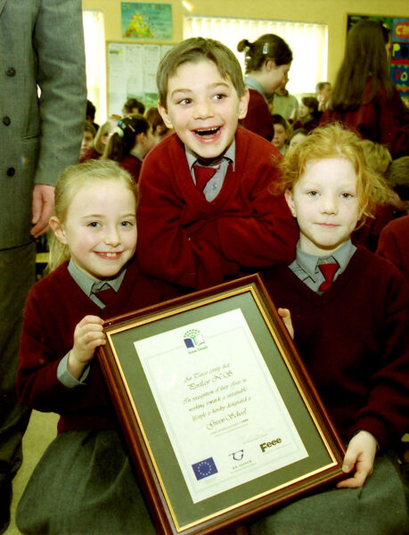  Claire Nolan, James Murphy and Siobhan Murphy, First Class Pupils at Portlaw NS, pictured with the certificate, which was awarded to their school in recognition of it becoming a Green School back in 2000.