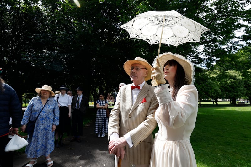 Don Ryan and Louise Whelan, dressed in Edwardian attires, take part in Bloomsday celebrations in Ringsend. Photograph: Nick Bradshaw/ The Irish Times