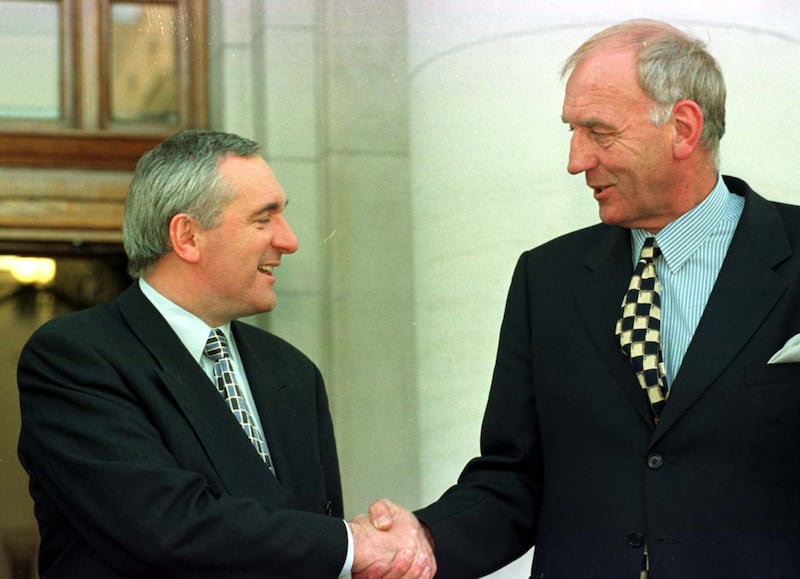 David Andrews shakes hands with then taoiseach Bertie Ahern after his appointment as minister for foreign affairs in 1997. Photograph: Collins