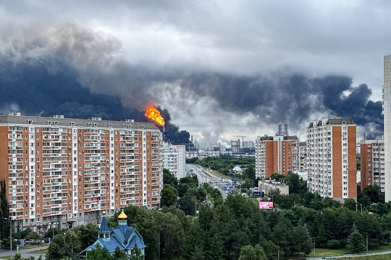 Black smoke rises from the area of a Moscow oil refinery on the southeastern outskirts of city on Thursday. Photograph: AFP via Getty