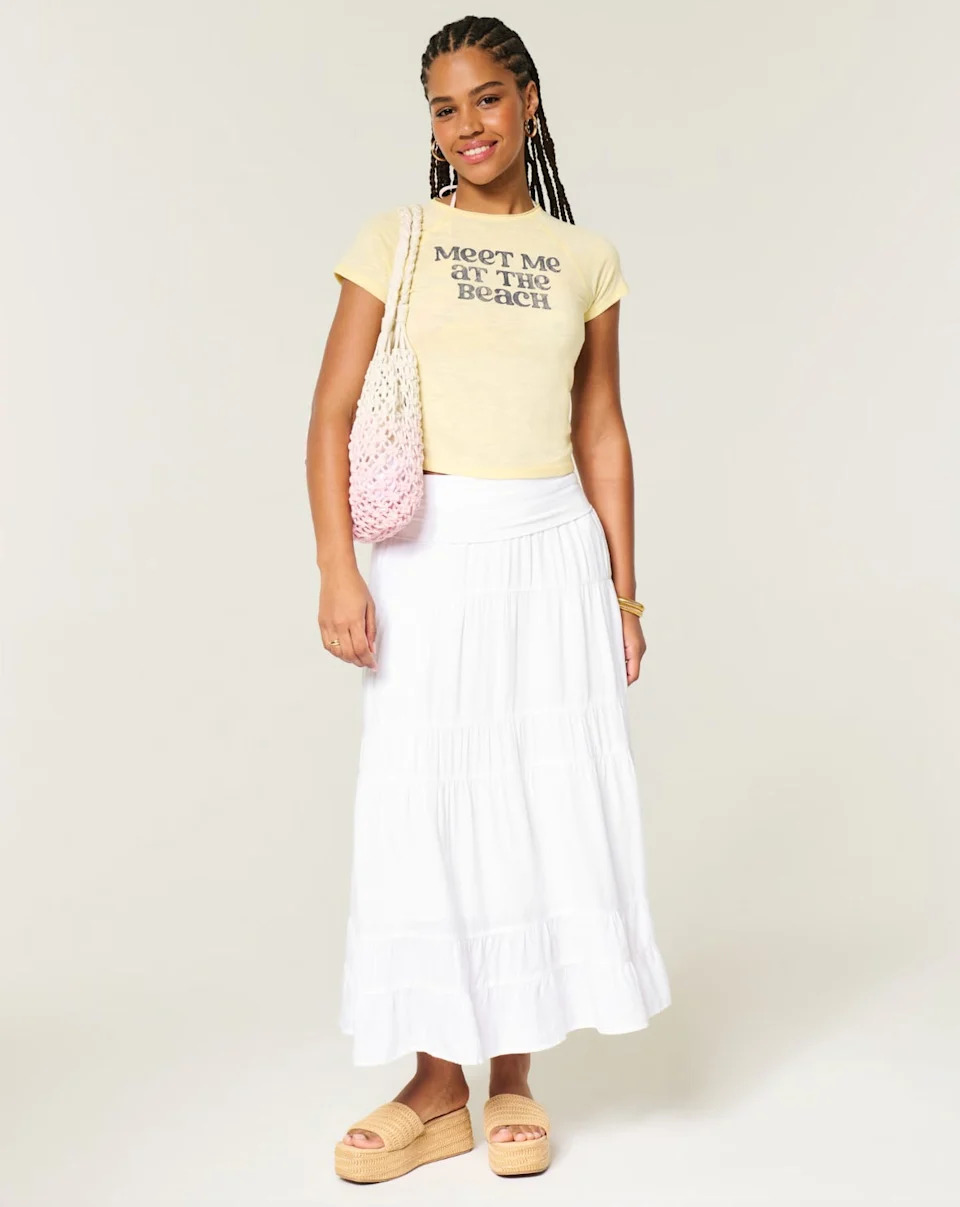 Too hot for denim? A white midi skirt is a summer staple