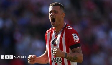 Granit Xhaka does a double fist pump celebrating a Sunderland win