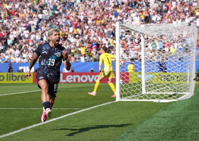 Paraguay's Julio Enciso celebrates scoring their goal to take a 1-0 lead. Photograph: Nick Potts/PA.