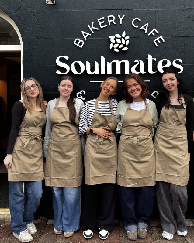 Staff members at Soulmates outside the café and bakery in Ardmore on the day it opened