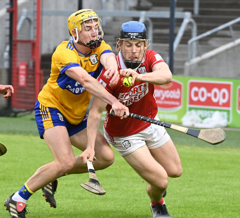 Cork's Barry O'Flynn wins the sliotar from Clare's Eoghan Gunning during the Fulfil Munster under 20 HC semi final at SuperValu Páirc Uí Chaoimh Picture: Eddie O'Hare