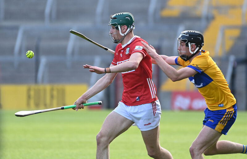 Cork's Colm Garde is tackled by Clare's Graham Ball during the Fulfil Munster under 20 HC ,round 5 at SuperValu Páirc Uí Chaoimh Picture: Eddie O'Hare