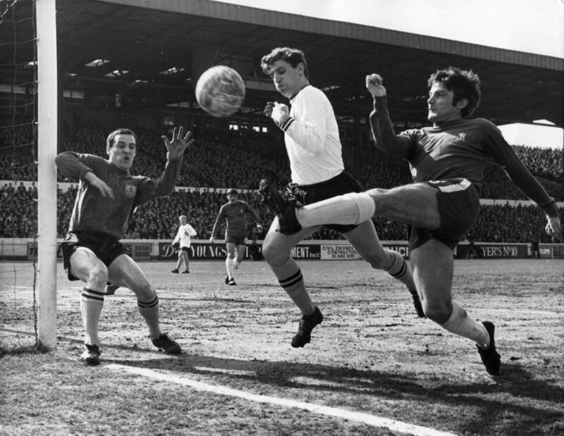 Bobby Tambling (right) of Chelsea tries a shot at goal from an acute angle, as Latcham of Burnley attempts to block him and goalkeeper, Thomson, covers his near post, during a match at Stamford Bridge. (Photo by Douglas Miller/Keystone/Getty Images)