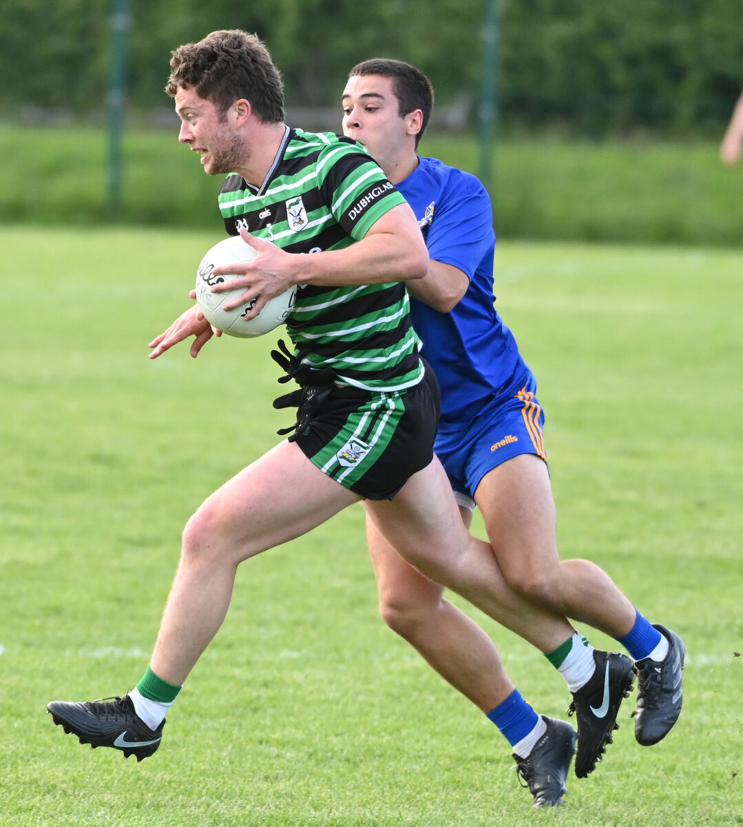 Douglas' Dylan Ward is tackled by St. Finbarr's Matthew Ahern during the McCarthy Insurance Group SFL division one game at Douglas. Picture; Eddie O'Hare
