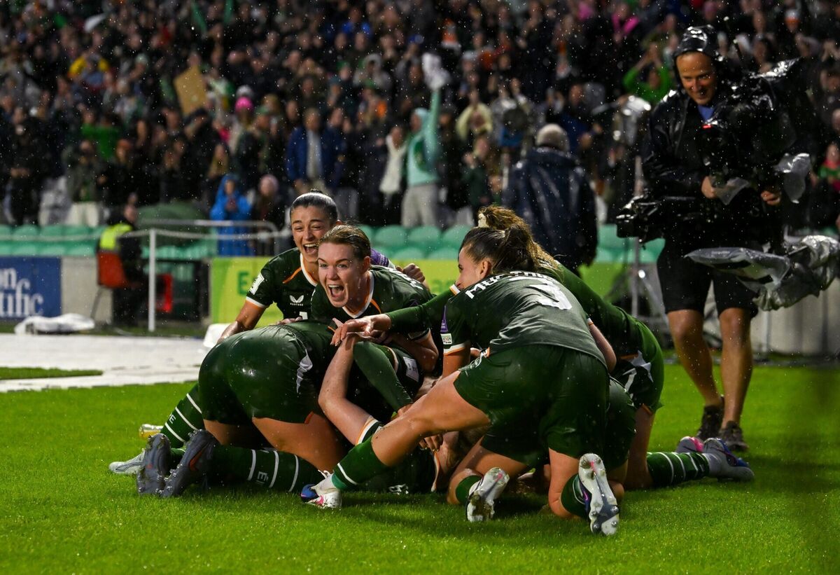 Amber Barrett hidden, celebrates with teammates. Pic: Stephen McCarthy/Sportsfile