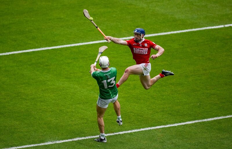 Seán O'Donoghue of Cork makes a flying block on a shot by Limerick's Aaron Gillane. Picture: Brendan Moran/Sportsfile