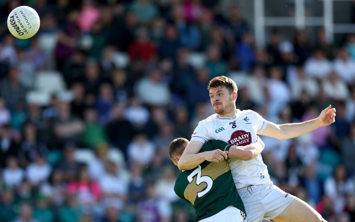 Kerry’s Jason Foley and Kevin Feely of Kildare. Pic: ©INPHO/James Crombie.