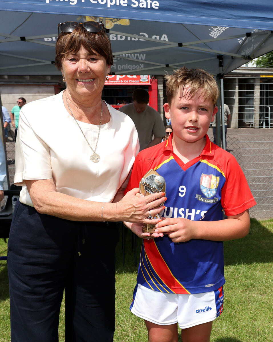  John Kerins Memorial Shield Final: Lee Gaels V's Brian Dillon's: Ann Kerins, presents the Shield Competition MVP trophy to Ciaran O'Riordan, Lee Gaels.
