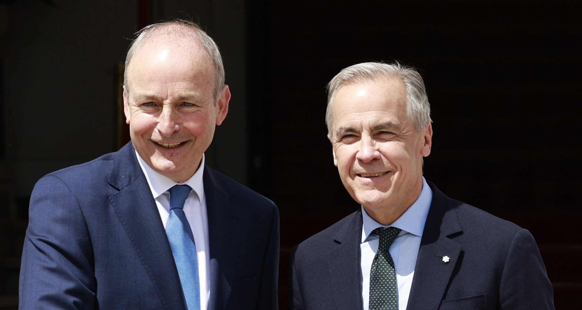 Taoiseach Micheal Martin TD (left) greets Canadian Prime Minister Mark Carney as he arrives for a visit to Government Buildings in Dublin, as part of his visit to Ireland. Picture date: Saturday June 13, 2026.