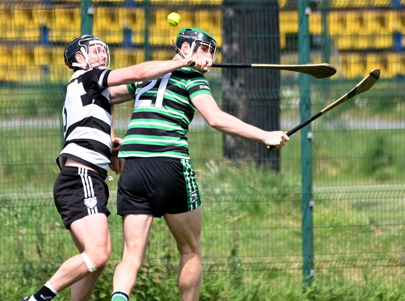 Midleton's Seán O'Sullivan and Douglas' Niall Hartnett tussle for the sliotar during the RedFM SHL division one game at Douglas. Picture; Eddie O'Hare