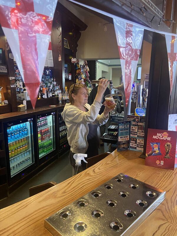 Kath Blackhurst behind the bar of the Station Hotel. She voted for Brexit.
