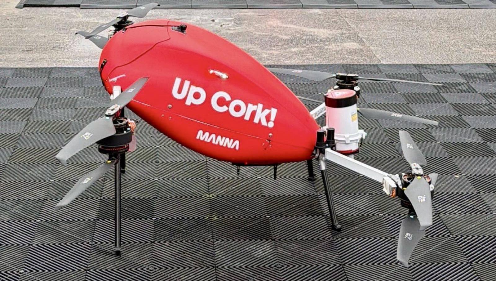 Manna delivery drone in the red colour of Cork with the message Up Cork! printed on the side. Picture: Larry Cummins