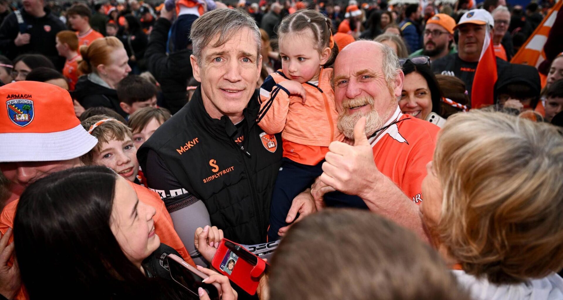 ORANGE WARNING: Armagh manager Kieran McGeeney with Armagh supporters. Pic: Ben McShane/Sportsfile