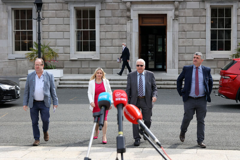 The Rural Independent Group Against the Carbon Tax — Michael Collins TD, Carol Nolan TD, Mattie McGrath TD, and Richard O'Donoghue TD — spoke to reporters outside Leinster House in April 2022. File picture: Sam Boal /Rollingnews