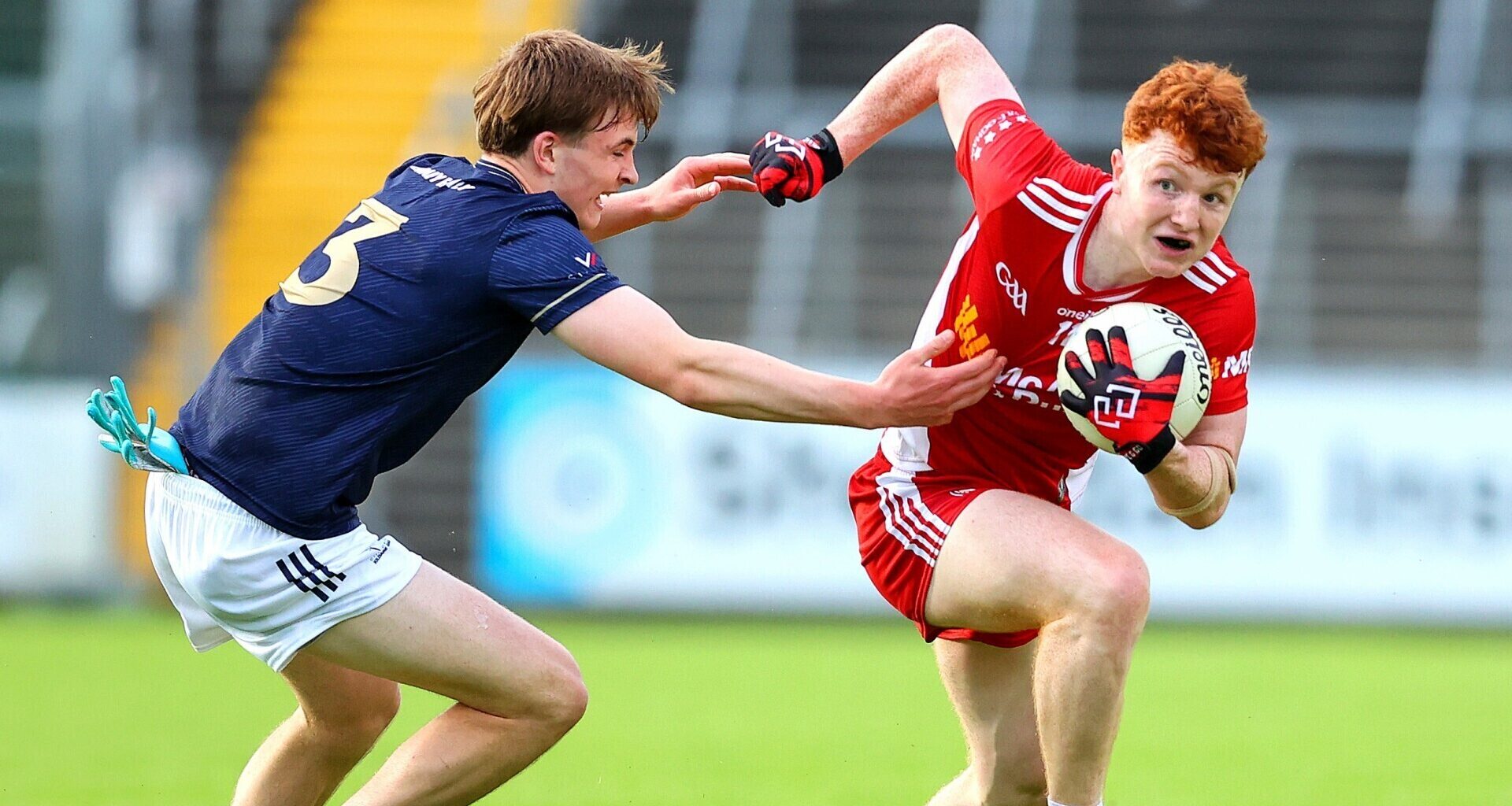 Tyrone's Brian Óg McGuckin with Ryan Crawford of Kildare. Pic: Tom O'Hanlon/Inpho