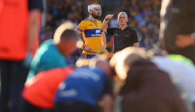 Clare's Conor Leen with referee James Owens as David Reidy receives medical treatment for a serious head injury. Pic: ©INPHO/Tom O'Hanlon