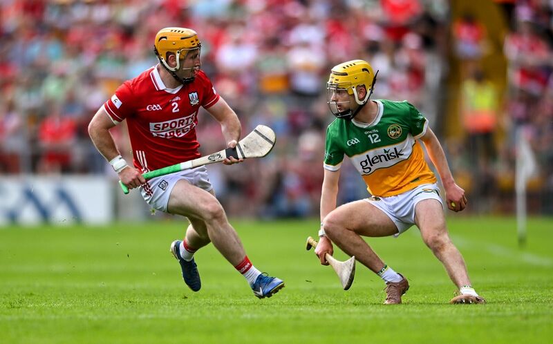 Niall O'Leary of Cork shadows Offaly's Daniel Bourke. Picture: Paul Phelan/Sportsfile