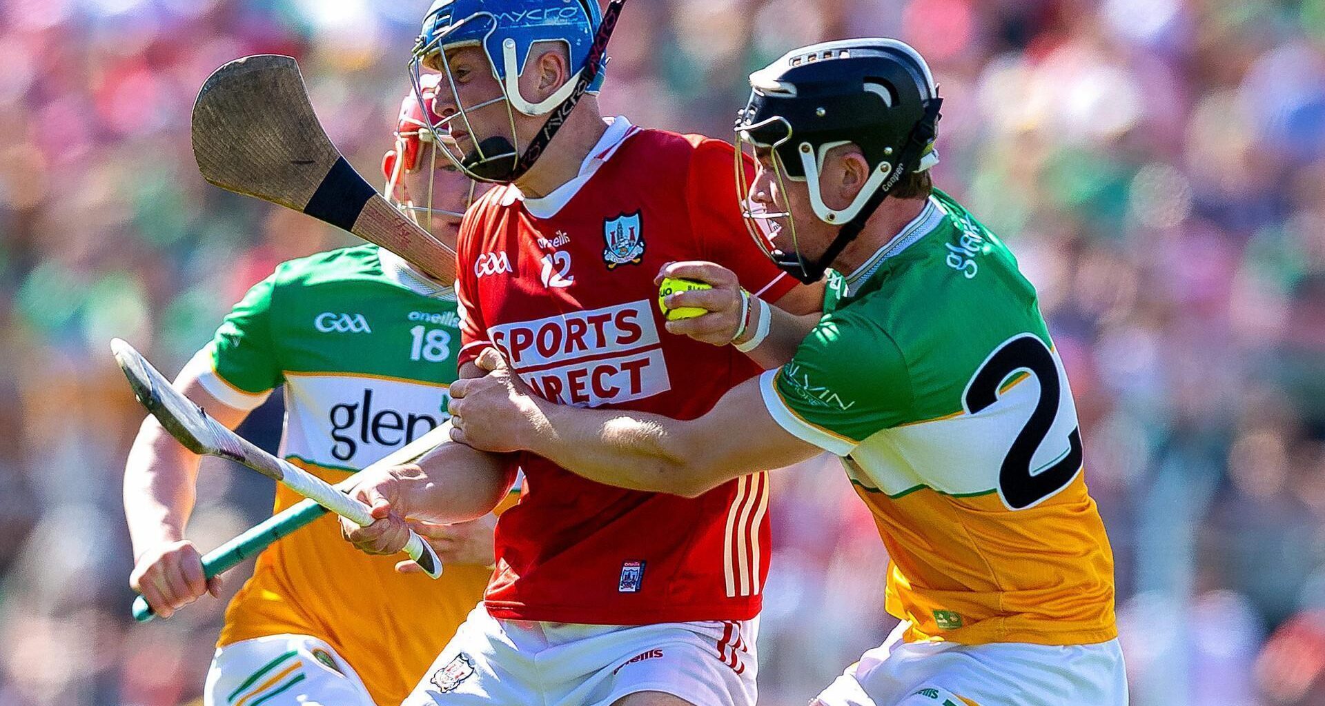 Cork's Diarmuid Healy with Eoin Burke of Offaly. Picture: INPHO/Tom O'Hanlon