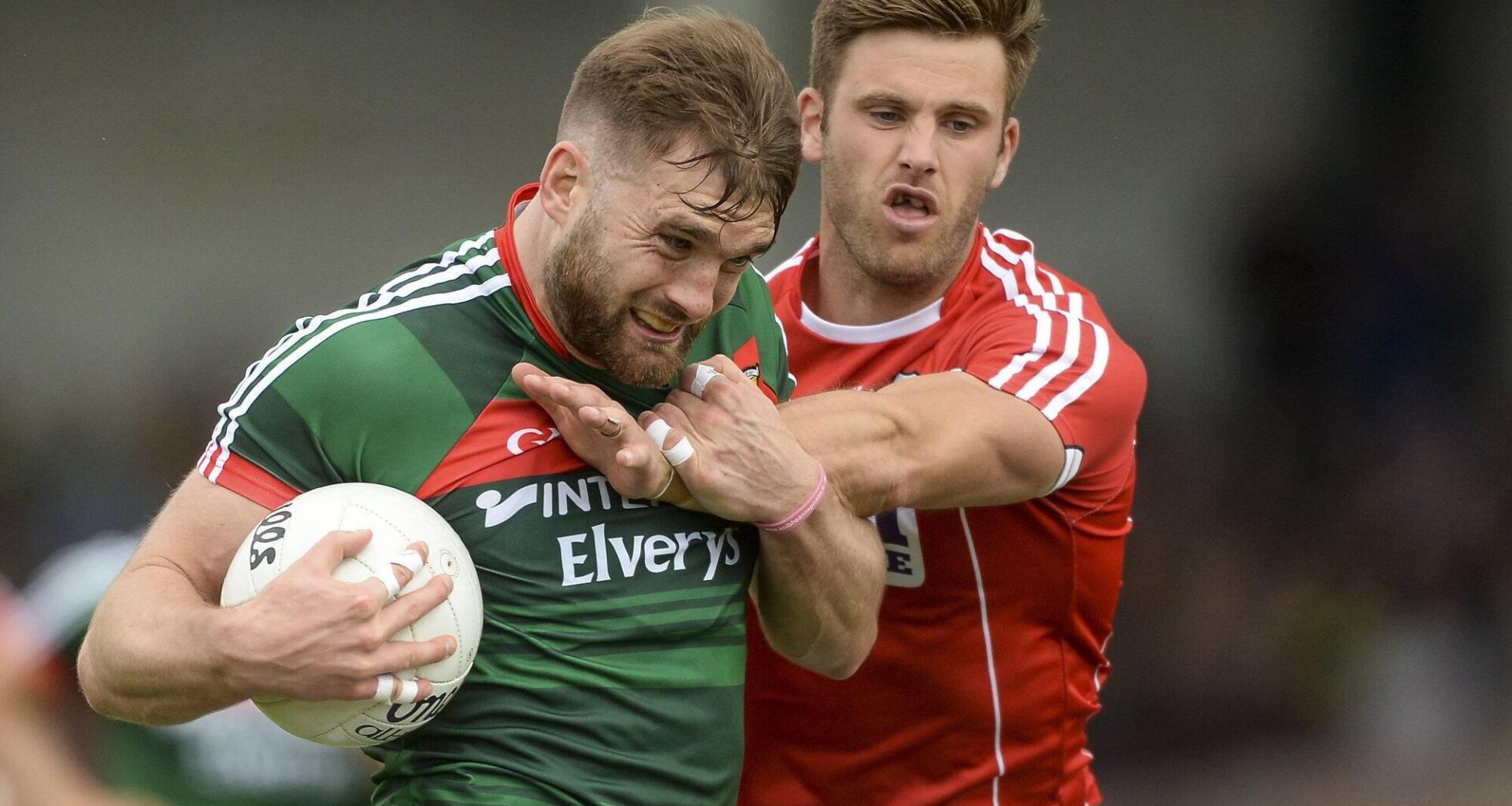 LAST EIGHT: Mayo's Aidan O'Shea in action against Cork's Eoin Cadogan in 2017. Pic: Piaras Ó Mídheach/Sportsfile.