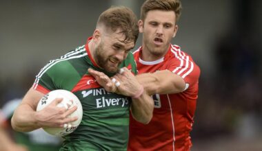 LAST EIGHT: Mayo's Aidan O'Shea in action against Cork's Eoin Cadogan in 2017. Pic: Piaras Ó Mídheach/Sportsfile.